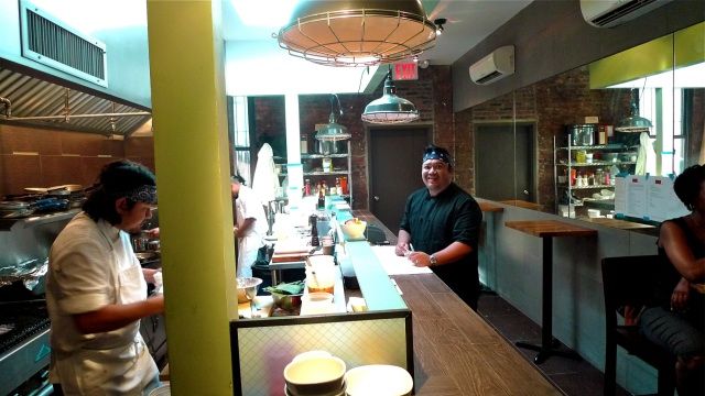 King Phojanakong and co-chef Soulayphet "Phet" Schwader (left) in the new Umi Nom kitchen. 